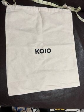 KOIO Natural Cotton Drawstring Bag with Black Logo